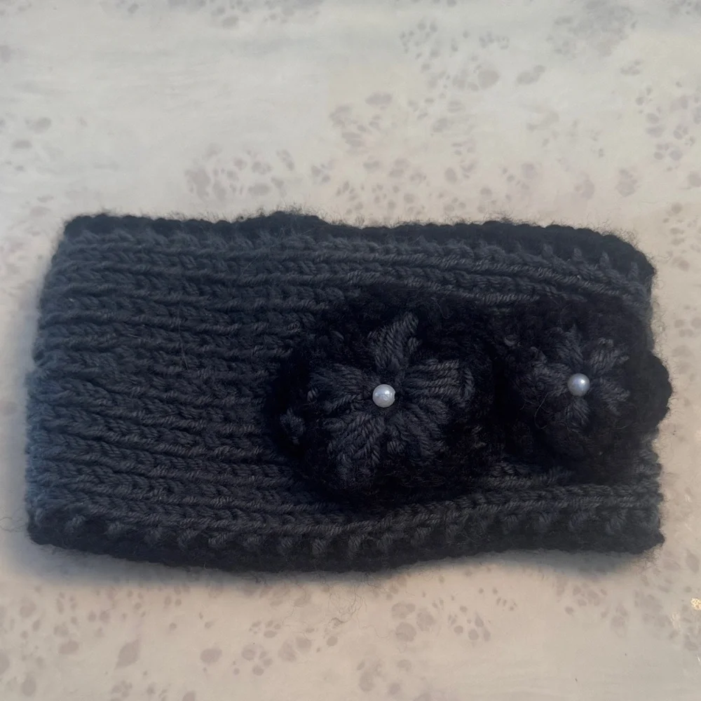 Elegant Black Knit Headband with Floral Accents